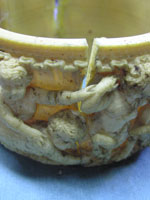 original condition of one of the ivory bands of lamp